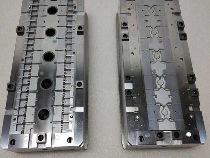 Semiconductor IC packaging mold cavities and inserts